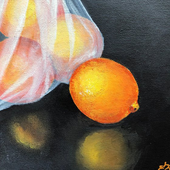 Oranges in plastic bag