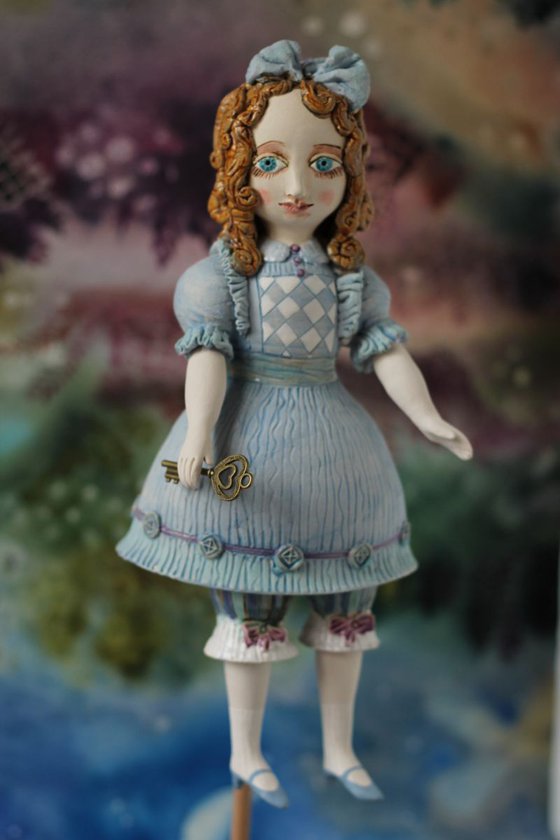 From the Alice in Wonderland. Alice as a little girl.  Wall sculpture by Elya Yalonetski