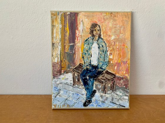 Portrait of a seated brunette