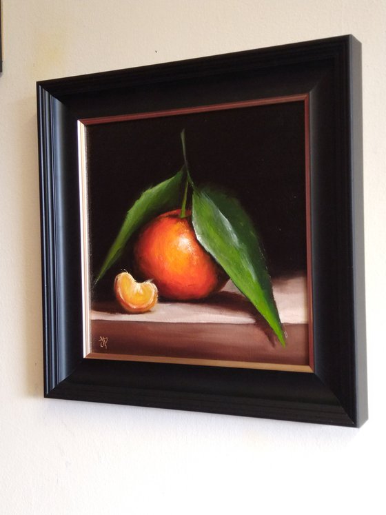 Clementine with segment still life