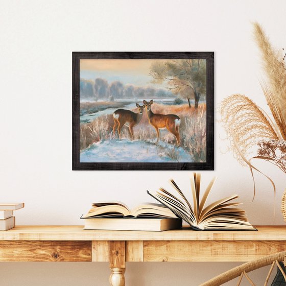 Snowy landscape with deer