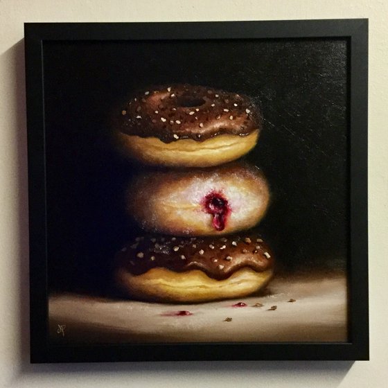 Donuts, jam in the middle still life