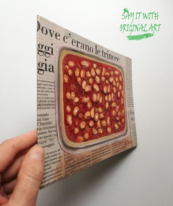 Bowl of Beans on Newspaper