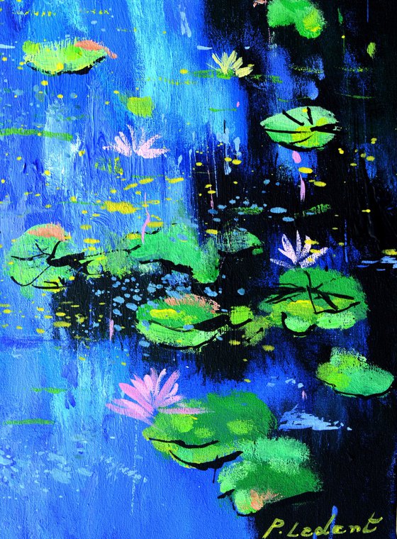 Waterlilies on a blue pond