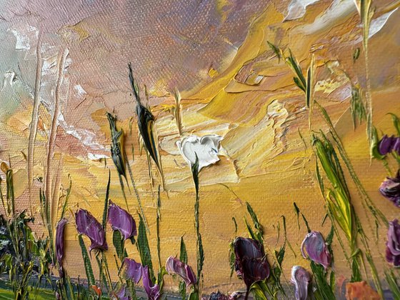 Yellow sunset with flowers