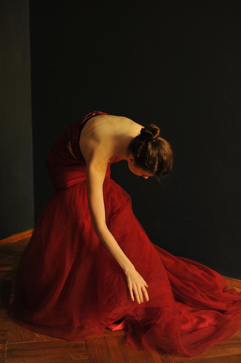 Woman in red dress by Maria Silent