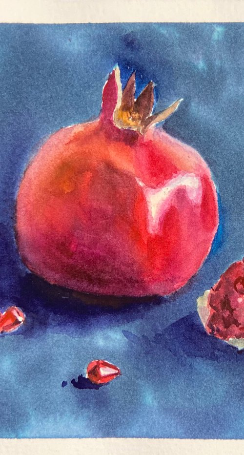 Pomegranates  on blue by Nataliia Nosyk