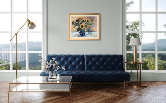 Sunflowers in a blue vase