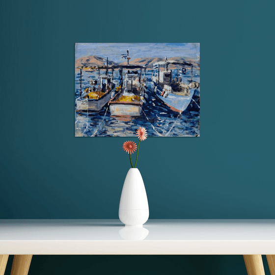 Three wooden boats