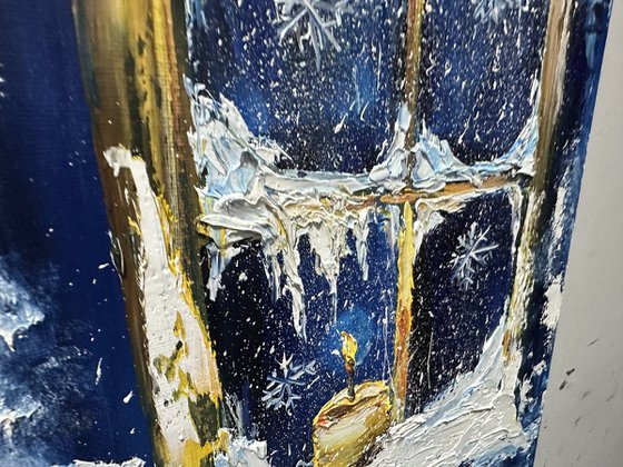 Winter window and candle