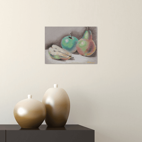 Pears hug an apple