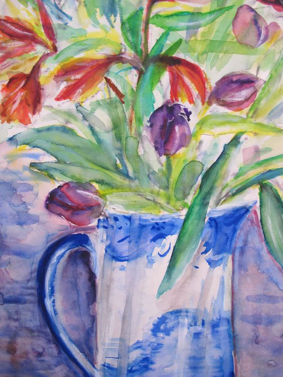 Flowers in a blue china jug