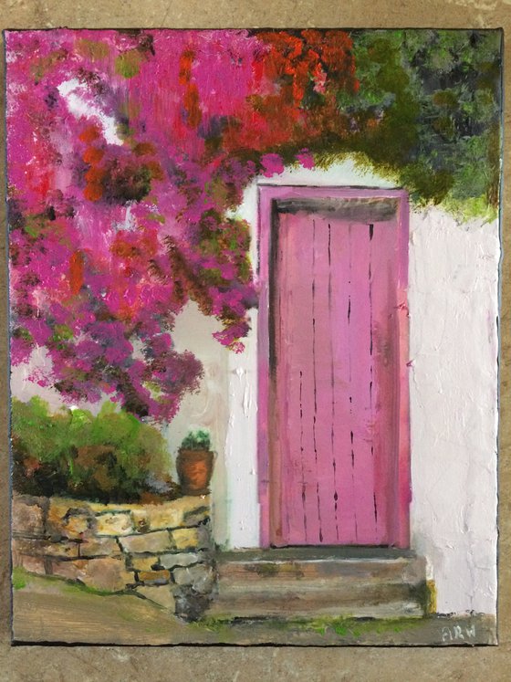 Mediterranean House with Pink Flowers