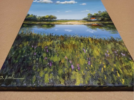 A farmstead by the river