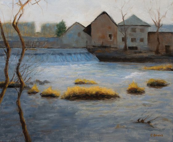 Weir and old industry on the river Vienne on a winter's day