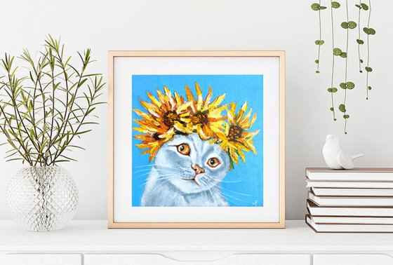 Cat and a wreath of sunflowers