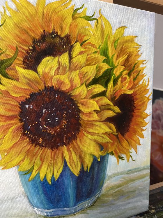 Sunflowers in a Blue Vase