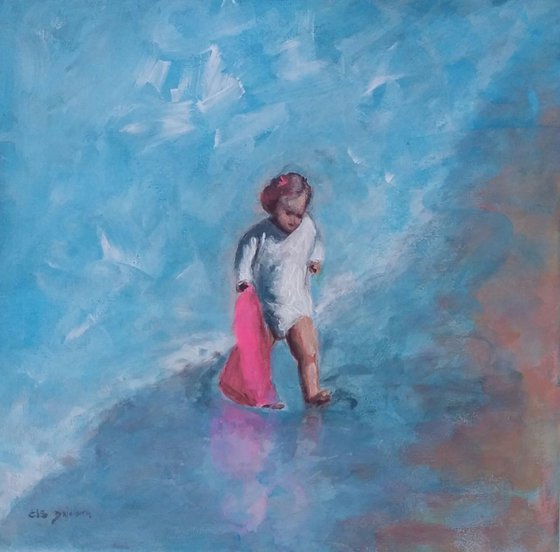 Child at the sea with towel