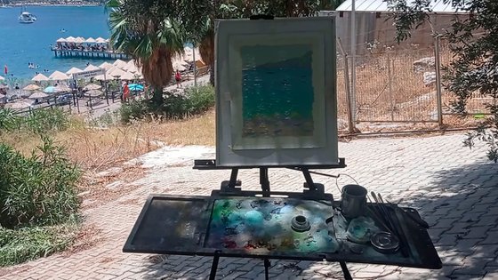 Yachts and umbrellas on the beach