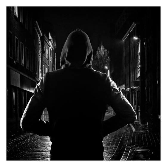 Night Silhouette #1/10. Limited Edition 12x12 inch Print of a Man wearing a hoodie in the street.