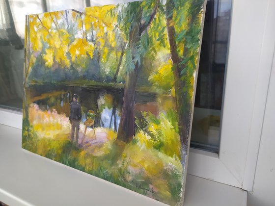 An artist near the lake
