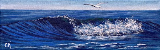 Seagull over the wave