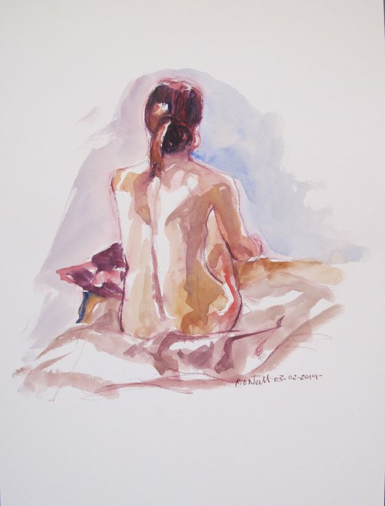 Seated female nude back view