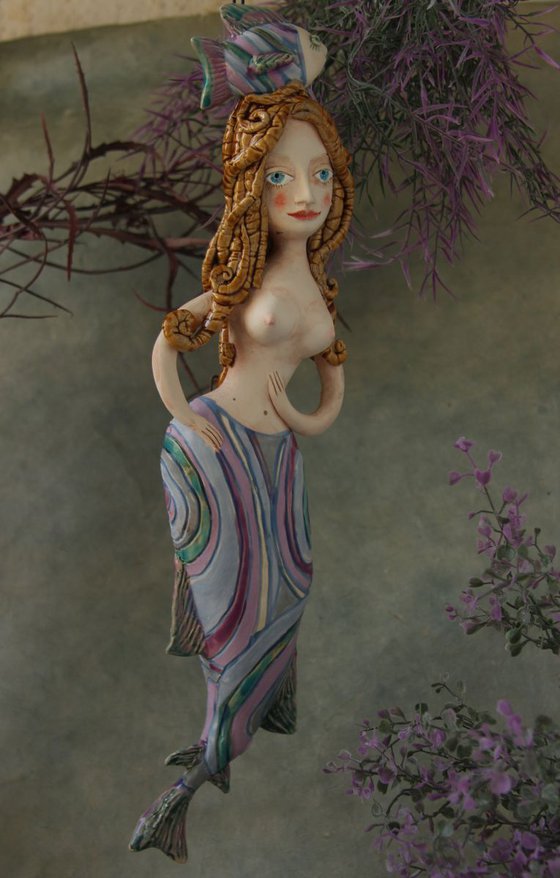 Mermaid with a fish,  Wall sculpture by Elya Yalonetski.