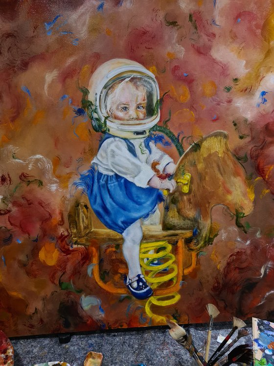 Spacebaby on a swing horse.