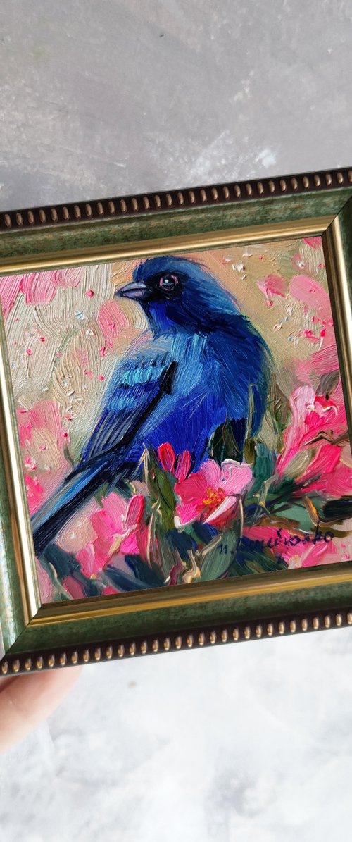 Bird on pink blossom branch by Nataly Derevyanko