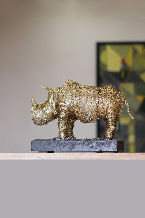 Golden rhino (20x30x12 2.9kg iron, brass, tufa)