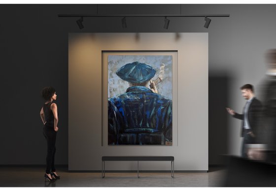 Man in blue smoking a cigar