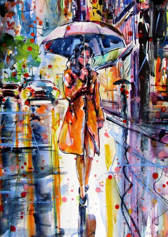 Woman walking in the rain