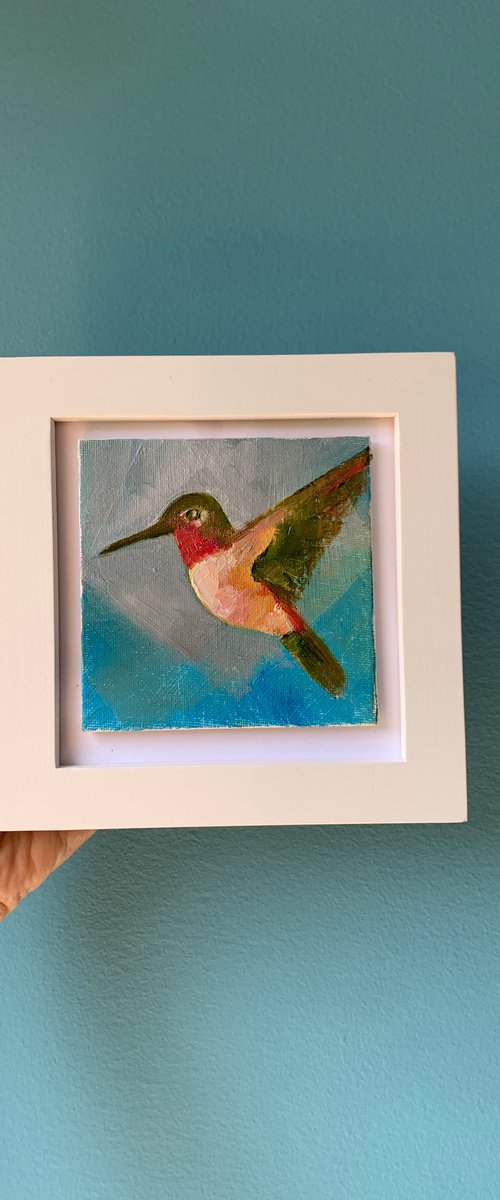 Hummingbird flying moment by Olha Gitman