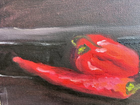 Still life with red peppers