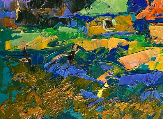Village and blue mountains