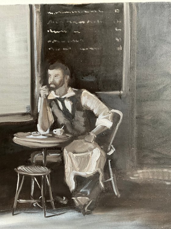 Waiter in cafe on a break