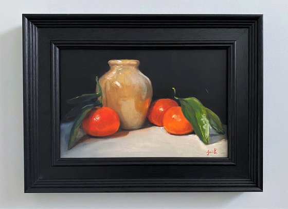 Still Life of Oranges and Studio Pottery.
