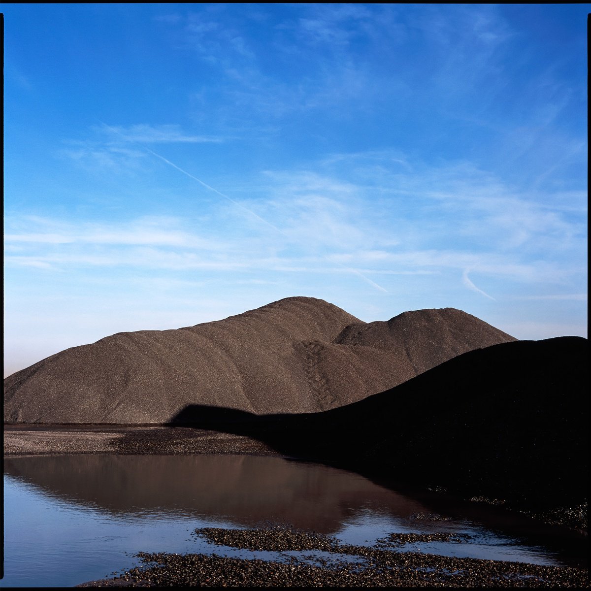 Heaps of Industrial Sand by Tom Hanslien