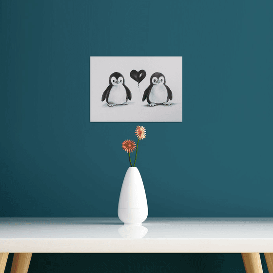 Two toy penguins