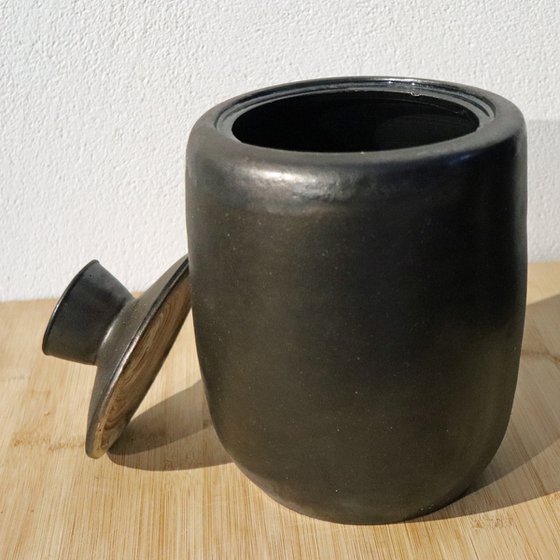 Large bronze vessel with lit