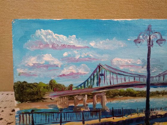 Sunny day and footbridge. pleinair painting