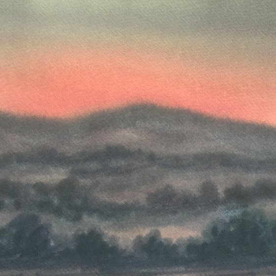 Pink dusk over Creech hill and Hartland moor, Dorset.