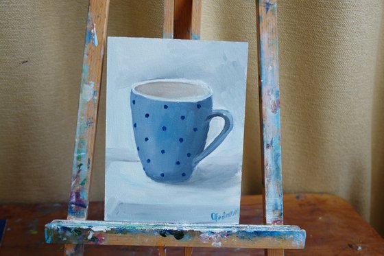 Polka dot teacup still life