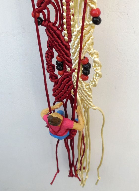 Boy Working on Macrame Wall Hanging