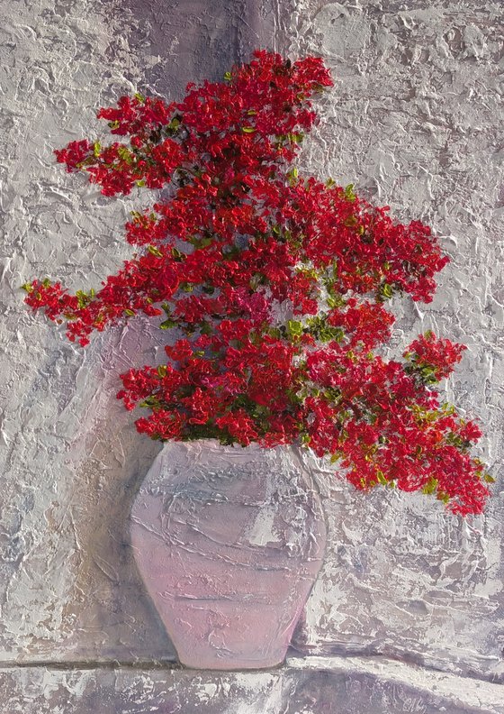 Red Flowers in a White Vase