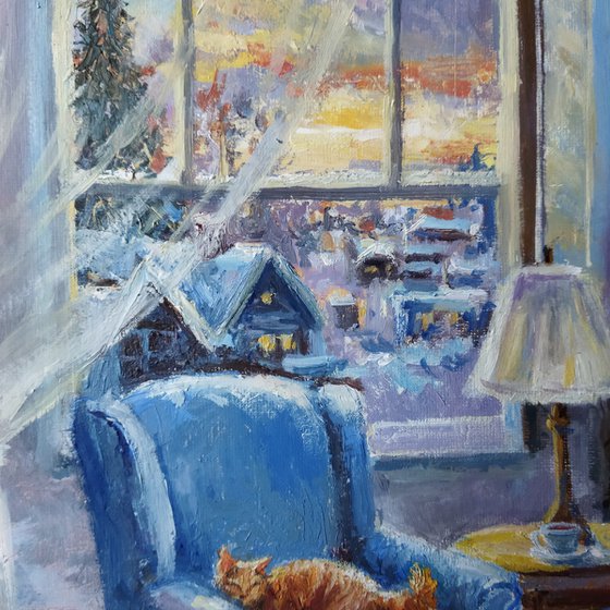 Ginger cat and armchair