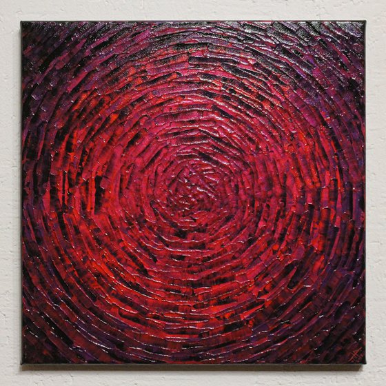 Concentric purplish red burst