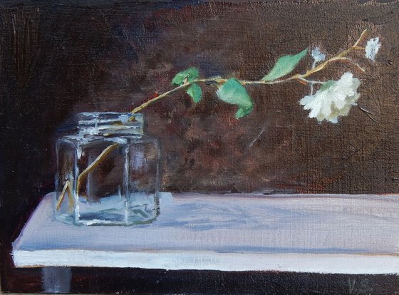 Flower in glass jar.