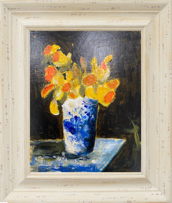 Daffodils in a blue vase